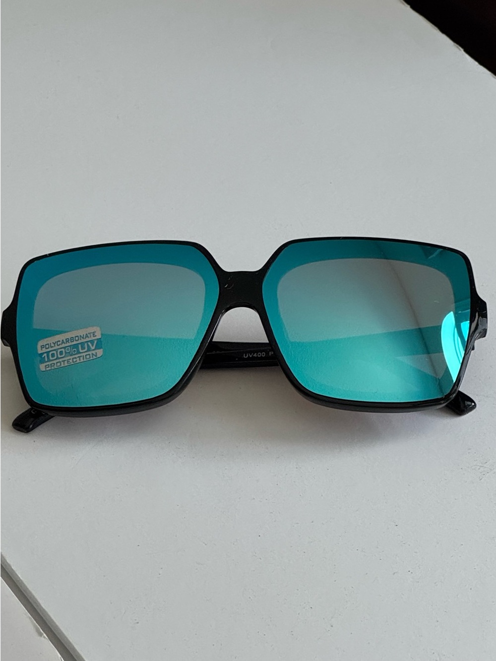 Black frame blue mirrored lens sunglasses